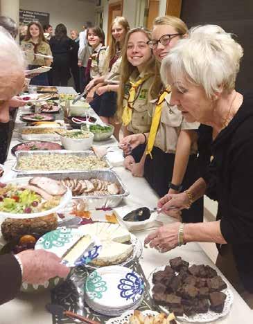 As a group, we often volunteer at the local Lithuanian parish, St. Peter s in Boston, by helping at kavutė, a luncheon after Lithuanian Mass.