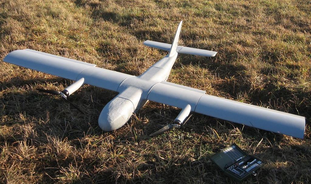Eksperimentinio skrydžio aprašymas Skrydis atliekamas su lėktuve įmontuota ir žemyn nukreipta vaizdo kamera. Sugeneruojamos galimos lėktuvo pradinės pozicijos - dalelės.