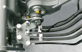 Jei reikia, tiesiog ant priedų tvirtinimo įtaiso, saugiai gali būti sumontuotos dvi dvikryptės hidraulinės jungtys.