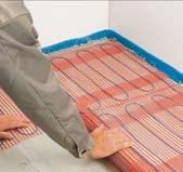 T2QuickNet: plonas šildymo kabelių kilimėlis Kaip įrengti T2QuickNet? Tiesiamas kabelis Užtepami klijai Klojamos plytelės Baigtos grindys Išvyniokite šildymo kilimėlį lipnia puse ant švarių grindų.
